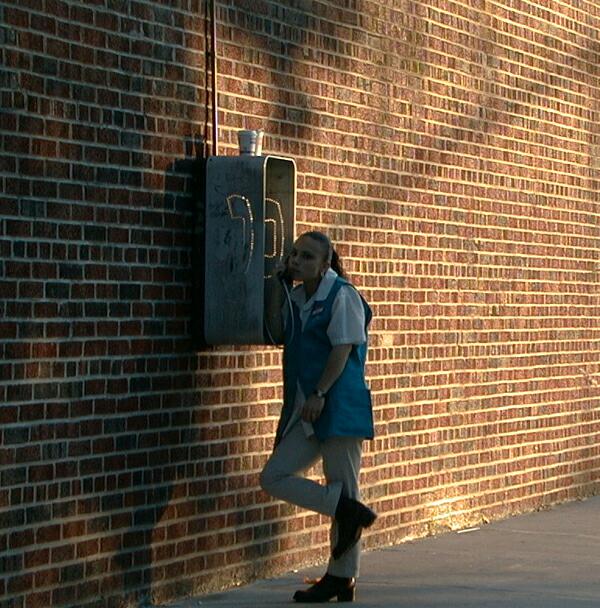 sorabji.com: Walgreen's employee using a payphone