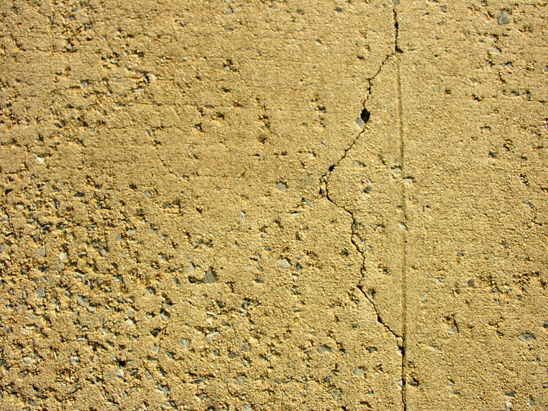sorabji.com: Face in Sidewalk
