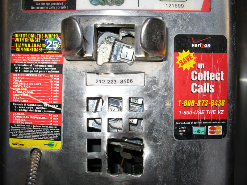 sorabji.com: Smashed up Verizon Payphone. (212) 223-8586